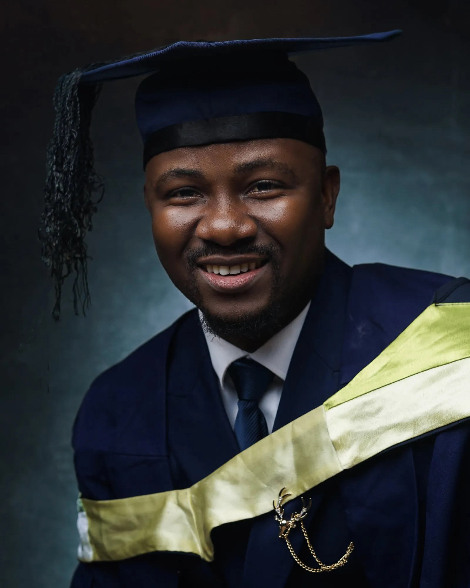 Portrait of Ibraheem Obanla in academic dress